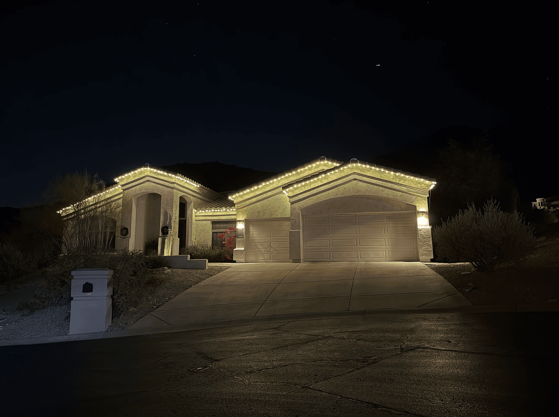 Arcadia home with white Christmas Lights