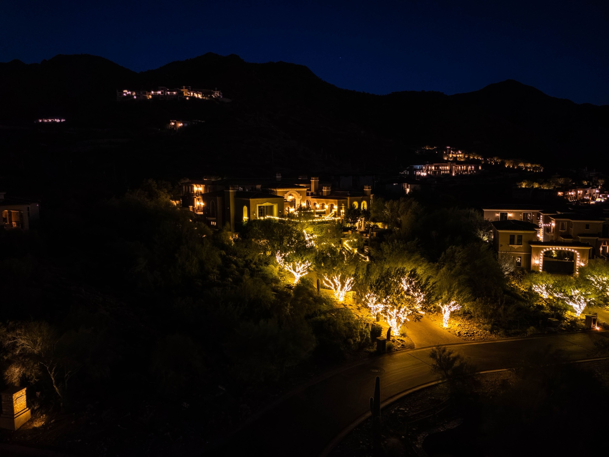 Hillside estate with roofline lighting installed